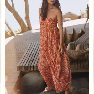 ANTHROPOLOGIE STRAPLESS TIE KNOT FRONT STRAPLESS HAREM JUMPSUIT SIZE LAR…